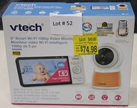 Box front with product image and features, highlighting 5-inch HD screen baby monitor by VTech
