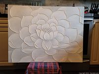 Front view of hand made original flower painting showing textured 3D petal relief.
