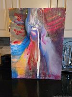 Front view of the original acrylic abstract painting with colors red, blue, purple, yellow and gray, showing dripping and fluid blending effects on canvas.