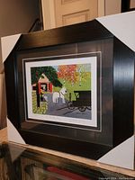 Full view of framed print with protective corner guards