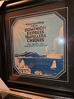 Close-up of framed silkscreen print showing text, artwork and matting.