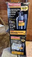 Box front of Craftsman Professional Submersible Portable Utility Pump with features and price tag visible.