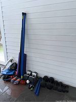 Overview of all fitness items including adjustable dumbbells, cast iron dumbbells, training bars, straps, grips, and accessories