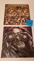 Front covers of two Jethro Tull vinyl records. Stand Up cover depicts band members' faces in sepia tone and Stormwatch cover shows a man looking through binoculars with icy background.