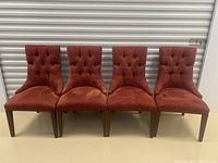 Front view of four chairs in a row showing overall condition and quantity
