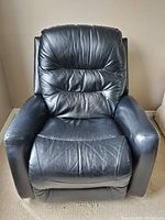Front view of black leather recliner