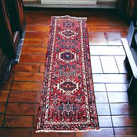 Full-length view on hardwood floor showing overall pattern and proportions