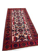 Rug laid flat, angled view showing full length and pattern