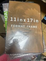 Front view of 11x17 format frame in original packaging showing the size and brand MCS