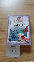 Front of sealed Insects and Spiders card game box showing insects illustrations and branding.