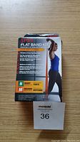 Front of SPRI Flat Band Kit packaging showing branding, usage instructions, and resistance level details.
