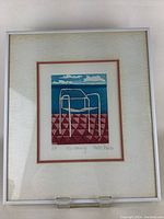 Full view of framed print showing mat and frame