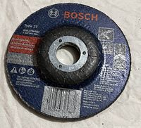 Close-up photo of Bosch disc showing brand, model type and condition