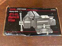 Front view of the product box showing the Craftsman 4.5-inch heavy-duty bench vise image and branding.