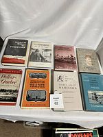 Full lot of 8 Canadian history hardcover books laid out together: titles include North West to Fortune, La Verendrye, Red River Revelations, The Great North West, Peddars Quebec, Edmonton Trader, The Explorations of Pierre Esprit Radisson, and Peter Fidler: Canada's Forgotten Surveyor.