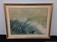 Full view of the framed watercolour painting showing wildflowers and grasses with a light color palette.