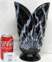 Front view of Blue Mountain Pottery vase with blue and white graniteware glaze alongside a Coca-Cola can for size comparison.