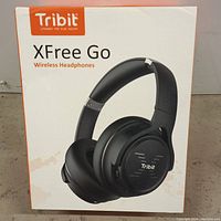 Front of the box showing Tribit XFree Go wireless headphones image and branding.