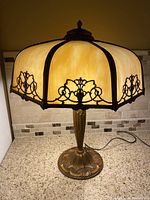 Front view of lamp illuminated on countertop