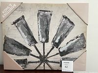 Clear image of the 20x16 canvas depicting a black, white, and gray windmill design, with Kohl's exclusive tag and protective corners.
