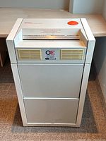 Front view of the EBA Allround 410 shredder showing intake slot, front vents, and cabinet door.