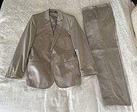 Full suit laid flat showing jacket and pants