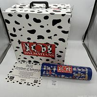 Full view of the Dalmatian spotted box with handle, Certificate of Authenticity, and blue promotional poster showcasing all the included toy figures.