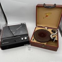 Overview photo showing the vintage Pal record player with case open and modern Victrola record player side by side.