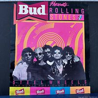 Rolling Stones 1989 Steel Wheels North American Tour poster featuring band members in black with pink, yellow, and black color scheme and Bud logo.