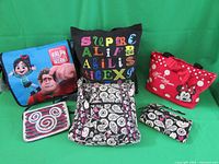 The full group of six assorted Disney-themed bags with Wreck-It Ralph, Minnie Mouse, and other designs visible