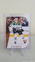 Front of Jason Robertson rookie hockey card showing image and RC logo.