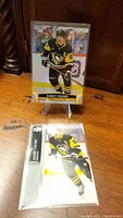Sidney Crosby hockey card on clear stand showing player in Penguins uniform
