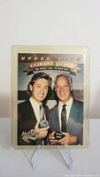 Front of Upper Deck hockey card showing Gordie Howe and Wayne Gretzky together with titles 'Mr. Hockey' and 'The Great One.'