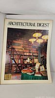 Front cover of Architectural Digest magazine January 1981 showing a traditional library interior with bookshelves and lighting.