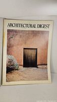 Front cover of Architectural Digest July 1981 issue featuring a rustic door