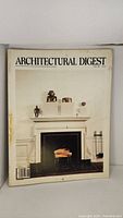 Front cover of the June 1981 issue of Architectural Digest magazine showing a white fireplace mantel with sculptures.