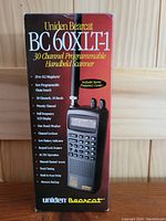 Sealed retail box showing Uniden Bearcat BC60XLT-1 branding and feature list