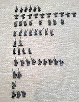 53 assorted Ral Partha metal miniature soldiers arranged in rows on carpet, showing many infantry poses including some with spears (some broken)