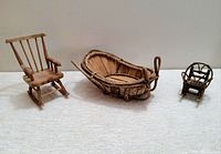 Photo of all three items: wood rocking chair, twig basket, small twig chair.