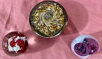 Top view showing all three paperweights together