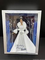 Front view of 2003 Holiday Visions Barbie Winter Fantasy Special Edition doll in original box showing full doll and winter themed packaging.