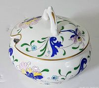 Jam jar with lid and ornate floral pattern from Coalport Pageant collection, showing the lid with handle and floral designs.