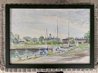 Framed watercolour painting of Cobourg Harbour showing boats docked and waterfront buildings.