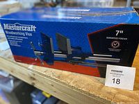 Box showing brand, product name, and image of woodworking vise.