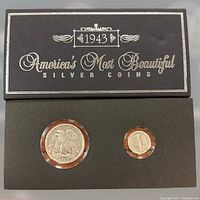 Top view of original black box with silver text '1943 America’s Most Beautiful Silver Coins'.