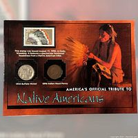 Front of display card showing a Native American holding a feathered headdress with the postage stamp, Buffalo nickel, and Indian Head penny.