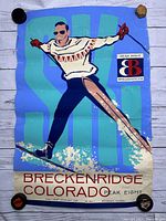 Full view of the vintage Breckenridge ski poster showing the skier and Breckenridge logo with signs of wear and creasing.