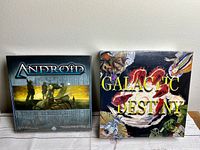 Both Android and Galactic Destiny board games side by side showing front box art and condition.