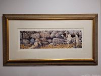 Full view of framed limited edition print showing hunting dog and natural rocky setting with autumn leaves.