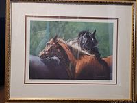 Framed print of horses titled "It's Mutual" by Judi Kent Pyrah shown in full view, framed with matt border.
